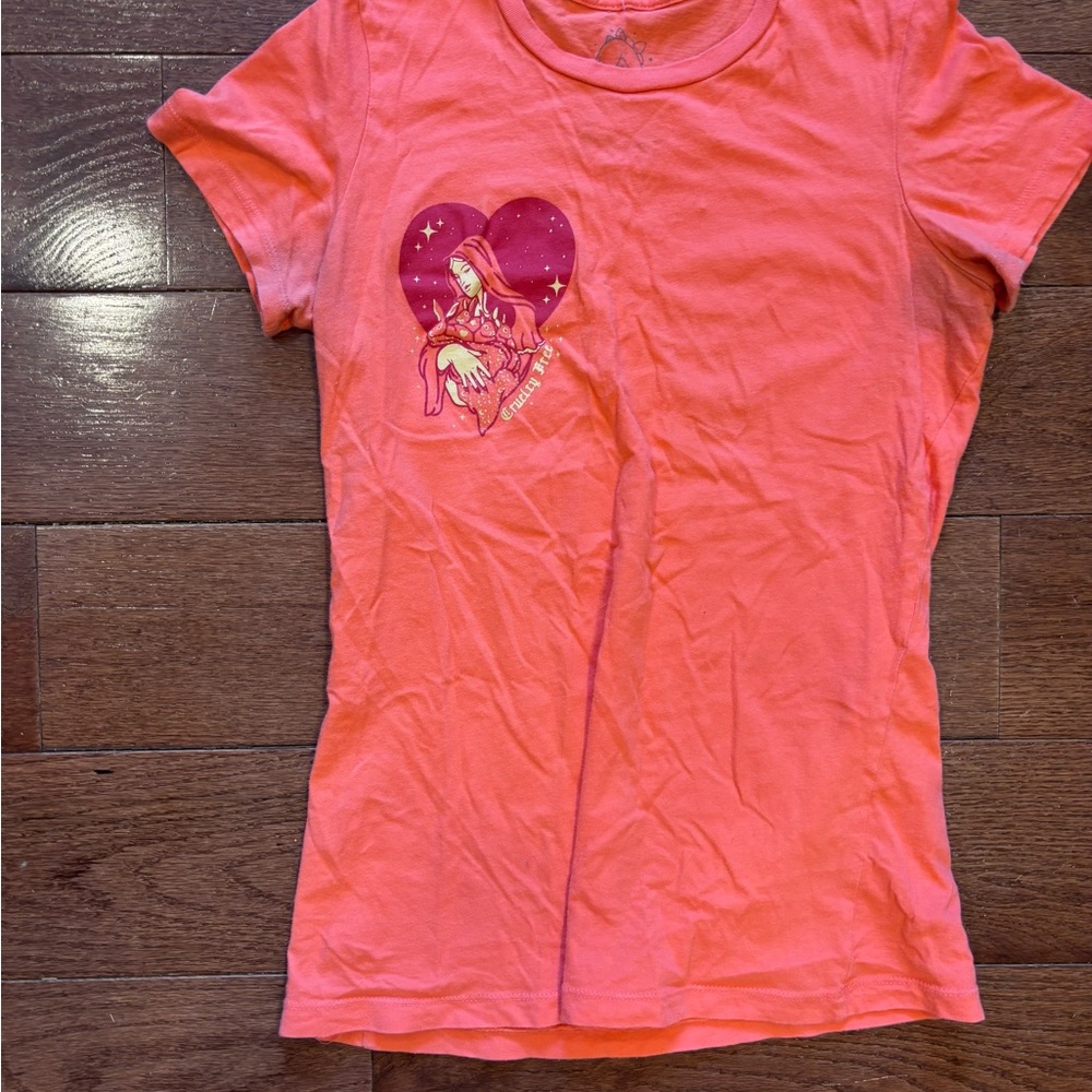 Woman’s Salmon Colored Graphic Tee